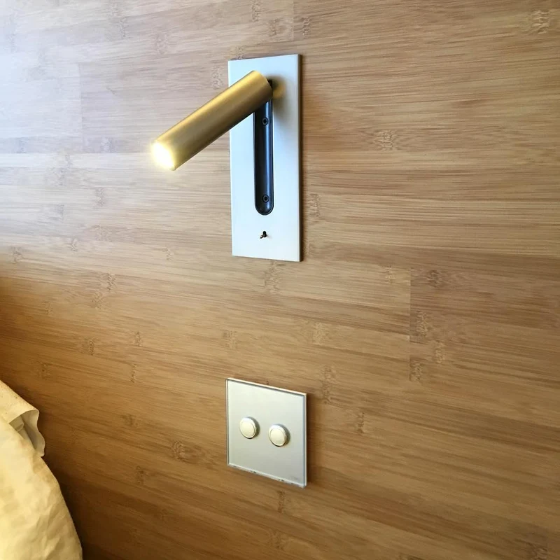 Wall-mounted reading lamp with built-in LED night light