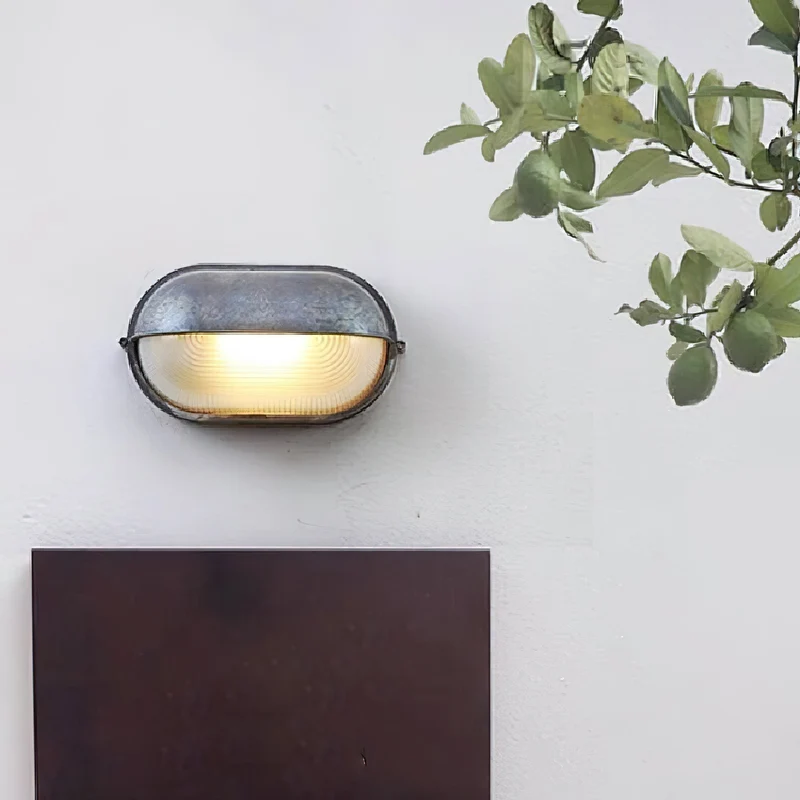 Outdoor industrial bulkhead wall lamp Oval weather-resistant design