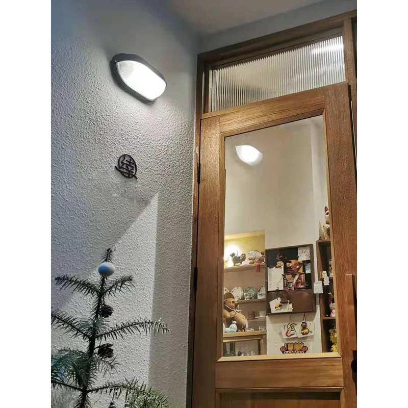 Outdoor industrial bulkhead wall lamp Oval weather-resistant design