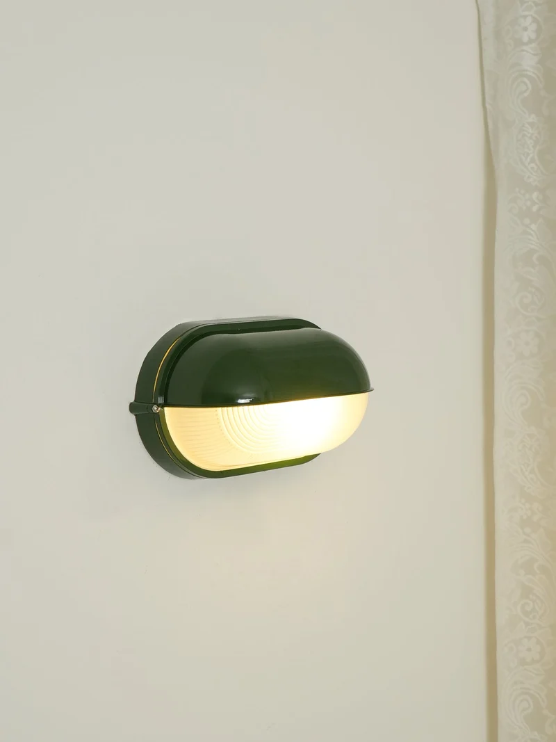 Outdoor industrial bulkhead wall lamp Oval weather-resistant design