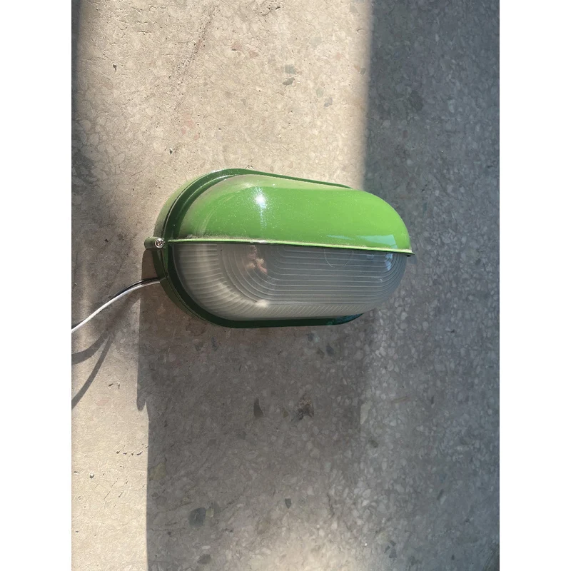 Outdoor industrial bulkhead wall lamp Oval weather-resistant design