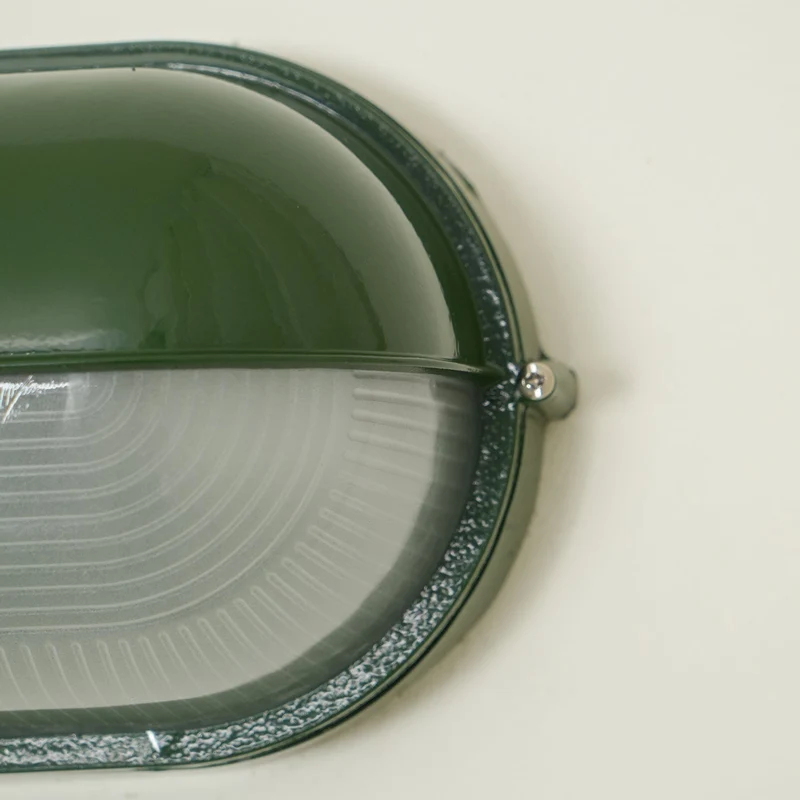 Outdoor industrial bulkhead wall lamp Oval weather-resistant design