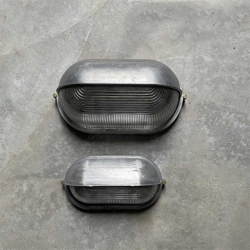 Outdoor industrial bulkhead wall lamp Oval weather-resistant design