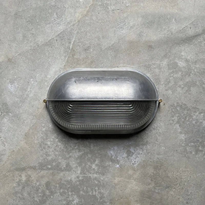 Outdoor industrial bulkhead wall lamp Oval weather-resistant design