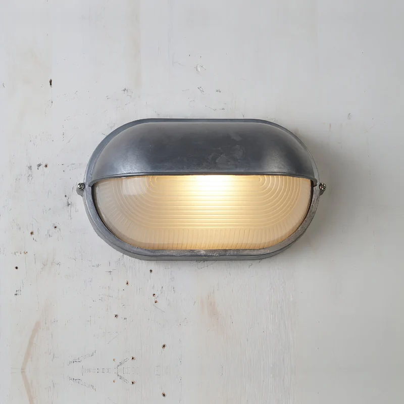 Outdoor industrial bulkhead wall lamp Oval weather-resistant design