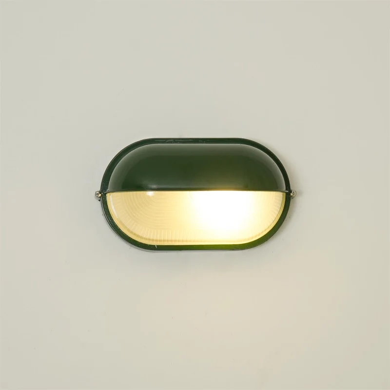 Outdoor industrial bulkhead wall lamp Oval weather-resistant design