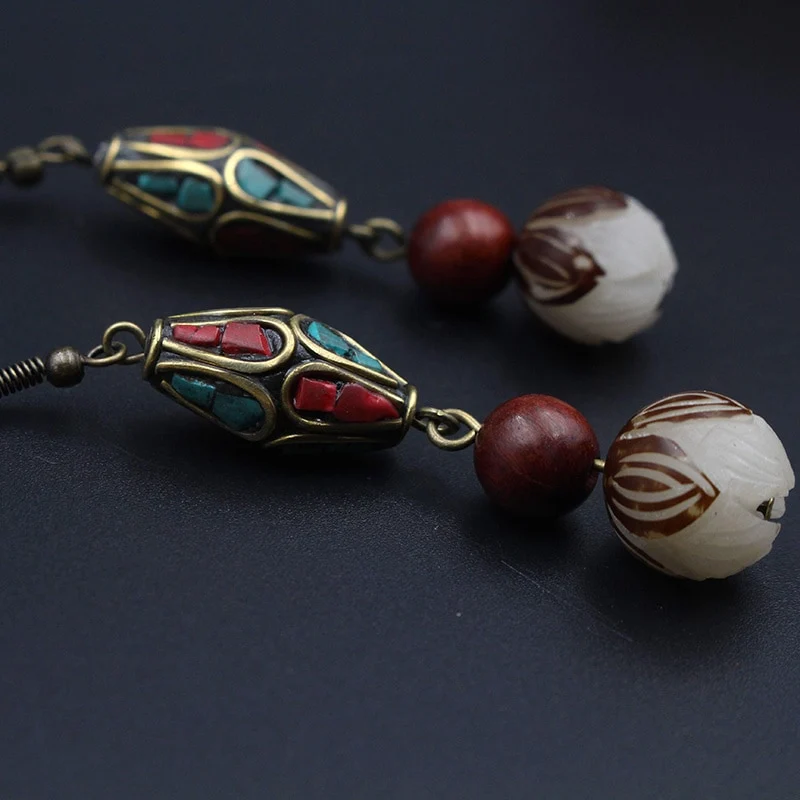 Boucles d'oreille ethniques en zinc
